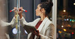 © Charlize Davids/peopleimages.com - Night, business and woman with tablet, glass wall and writing with research for proposal, thinking or planning. Person, evening or agent with tech, professional or website for creativity and deadline
