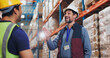 © peopleimages.com - Business, warehouse and men with conversation, friends and industry with inventory, planning and teamwork. Safety, people and guys with stock, hardhat and logistics with shipping, cargo and support