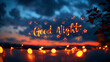 © h3design - A lit-up Good Night sign hangs against a backdrop of a twilight sky, with string lights illuminating the scene