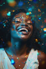 Wall Mural - Confetti party celebration with happy woman laughing and having fun