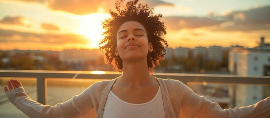 Canvas Print - Woman Enjoying Sunset on Rooftop Balcony