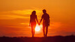 © Muhd Harith - Couple holding hands at sunset