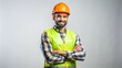 © Wanlop - Confident construction worker in a reflective safety vest with crossed arms smiling, posing on a transparent background with a neutral tone and no other objects.