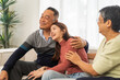 © Art_Photo - Portrait enjoy happy smiling love asian family.Senior mature father hug with elderly mother and young adult woman play laughing and having fun together at home.insurance concept