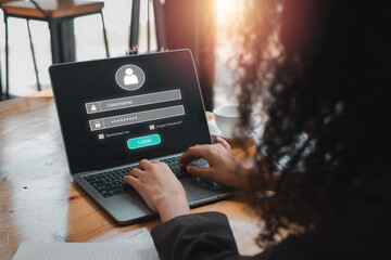 Login and password concept, Businesswoman using laptop computer on desk with login and password icon on virtual screen, cyber security, data protection and secured internet access, cybersecurity