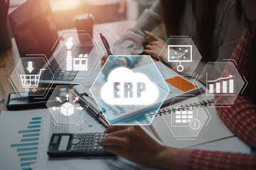 Wall Mural - erp, enterprise resource planning concept, business team analyzing income charts and graphs on offic