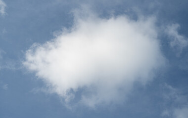 Canvas Print - Cumulus clouds in the blue sky.