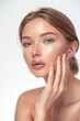 © SHI - Spa or cosmetics advertisement, beauty concept, cosmetic concept, skin medical beauty concept, beautiful woman touching her face with beautiful skin, young girl model touching neck,
