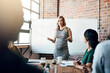 © peopleimages.com - Pregnant woman, presentation and meeting on whiteboard office for feedback, planning or ideas of strategy development. People, speaker and teamwork for support, solution or business proposal pitch