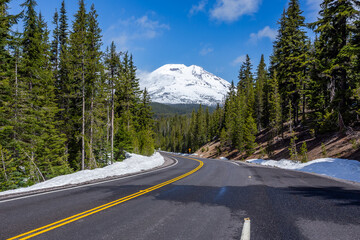 Wall Mural - Way to the top. Road in snowy environments in Cascade Lakes area