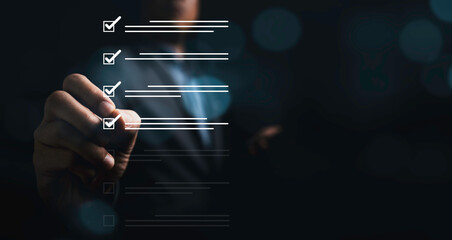 Fototapete - Businessman use pen to virtual tick correct sign mark for project and document approval , Quality and ISO concept.