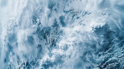 Wall Mural - A mesmerizing aerial view of a blizzard captured from high above by a satellite revealing intricate patterns and layers of snow and ice