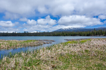 Wall Mural - Lava Lake and Mountain range of Sisters on the background