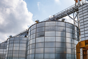 Wall Mural - silos granary elevator on agro-industrial complex with seed cleaning and drying line for grain storage