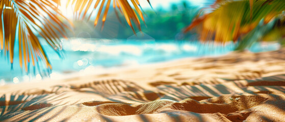 Wall Mural - A vibrant beach scene with golden sand, palm leaves in a beautiful blur in the foreground