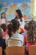 © esp2k - A group of children sit in a classroom with a teacher