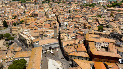 Aerial view of the Civic Tower in Piazza Plebiscito in Viterbo, Lazio, Italy. It is one of the symbols of the historic center of the city.