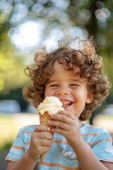 Wall Mural - little boy eats ice cream on the background of nature. Selective focus