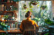 © Pompozzi - Woman Working at Home Office Surrounded by Plants
