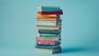 © horizon - A stack of books on blue background, symbolizing knowledge and education. The pile includes various sizes and colors to show diversity in reading materials.