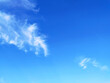 © SolaruS - Clear blue sky texture and white fluffy cloud nature background. The sun shines bright in the daytime in summer
