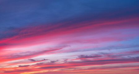 Wall Mural - Panorama of Beautiful Sky with clouds glowing after sunset for sky replacement