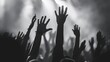 © Bijac - hands raised in fervent prayer during a special moment of worship at a church conference black and white banner photo