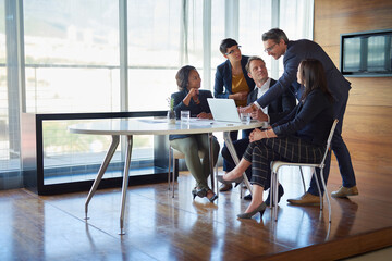 Wall Mural - Business, people and laptop in boardroom with strategy or idea on project with teamwork and collaboration. Employee, discussion and office with conversation as partners in law firm, lawyers and plan