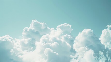 Wall Mural - Soft focused white clouds against a blue sky with room for text