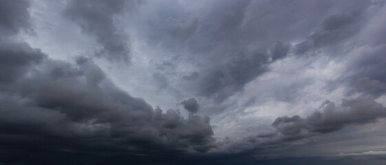 Aufkleber - Bad or moody weather sky and environment. carbon dioxide emissions, greenhouse effect, global warming, climate change. The dark sky with heavy clouds converging and a violent storm before the rain.
