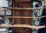 A stack of skateboards on a special outdoor stand