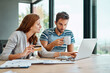 © peopleimages.com - Credit card, laptop and couple at table in morning for online shopping with purchase in house on weekend. Finance, taxes and internet banking with bills or monthly payments for debt in New York.