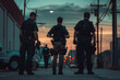 © KirKam - Police officers equipped with gear walking down a city street at dusk, prepared for a nighttime operation