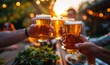 © anatoliycherkas - Cheers! Clink glasses. Close-up shots of hands holding beer glasses and beer bubbles.