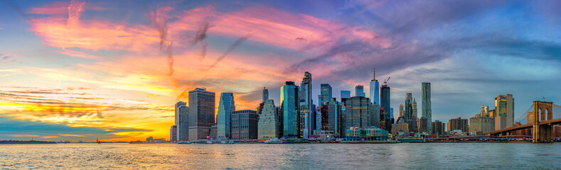 Wall Mural - Panoramic view on Manhattan and Brooklyn bridge at sunset, New York City