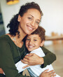 © DL/peopleimages.com - Hug, mother and boy child in portrait together with smile for love, family and development at home for weekend break. Happy, woman and son embrace in house with care for resting, bonding and support