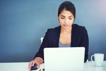 Poster - Laptop, copywriter and woman in working, reading on internet at office with serious for research. Creative, person and technology in online, digital and website for deadline, due date or project