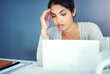© Cecilie S/peopleimages.com - Business woman, headache and stress on laptop for copywriting deadline, report or research on wall background. Tired freelancer, editor or online writer with fatigue, burnout or confused for bad news