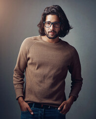 Sticker - Fashion, glasses and portrait of man in studio with stylish, elegant and winter outfit. Serious, spectacles and male model from Australia with trendy, cool and designer clothes by gray background.