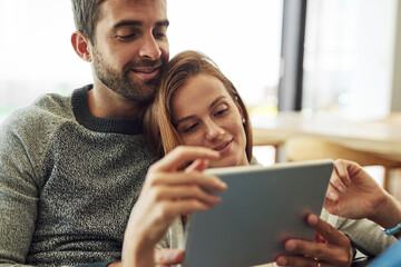 Canvas Print - Happy, couple and hug with tablet for streaming app, scrolling and movie selection at home. Smile, man and woman with technology and digital subscription for bonding, search and entertainment choice