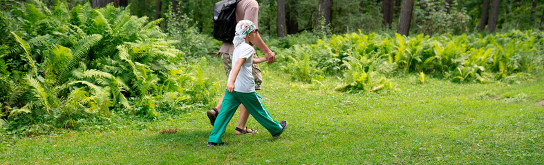 Poster - Father and son hiking in the forest 