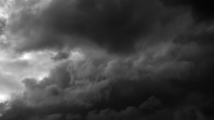 Wall Mural - time-lapse of separate white clouds on a black background have real clouds. time-lapse of White cloud isolated on a black background realistic cloud. time-lapse of white fluffy cumulus cloud isolated