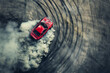 © Patthamaporn - top view drifting car, racing