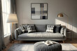 © Nyetock - Grey sofa with cozy pillows, plaid and lamp near window in light living room