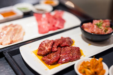 Canvas Print - Slice of fresh beef meat in Japanese grill restaurant