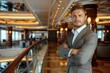 © visoot - A portrait of smart man on main floor of luxury liner. Generative AI.