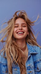 Wall Mural - A happy woman with blonde hair wearing a denim jacket, captured in motion