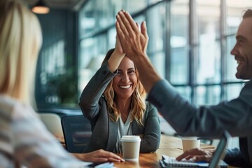 Wall Mural - Businesswoman giving a high five to male colleague in meeting. ai generated