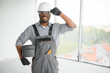 portrait of an African American construction worker on location