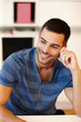 © DL/peopleimages.com - Thinking, relax and man with smile in home for weekend, peace and memory or day dream. Male person, remember and happy in lounge for idea, decision and choice in apartment with pride or confidence